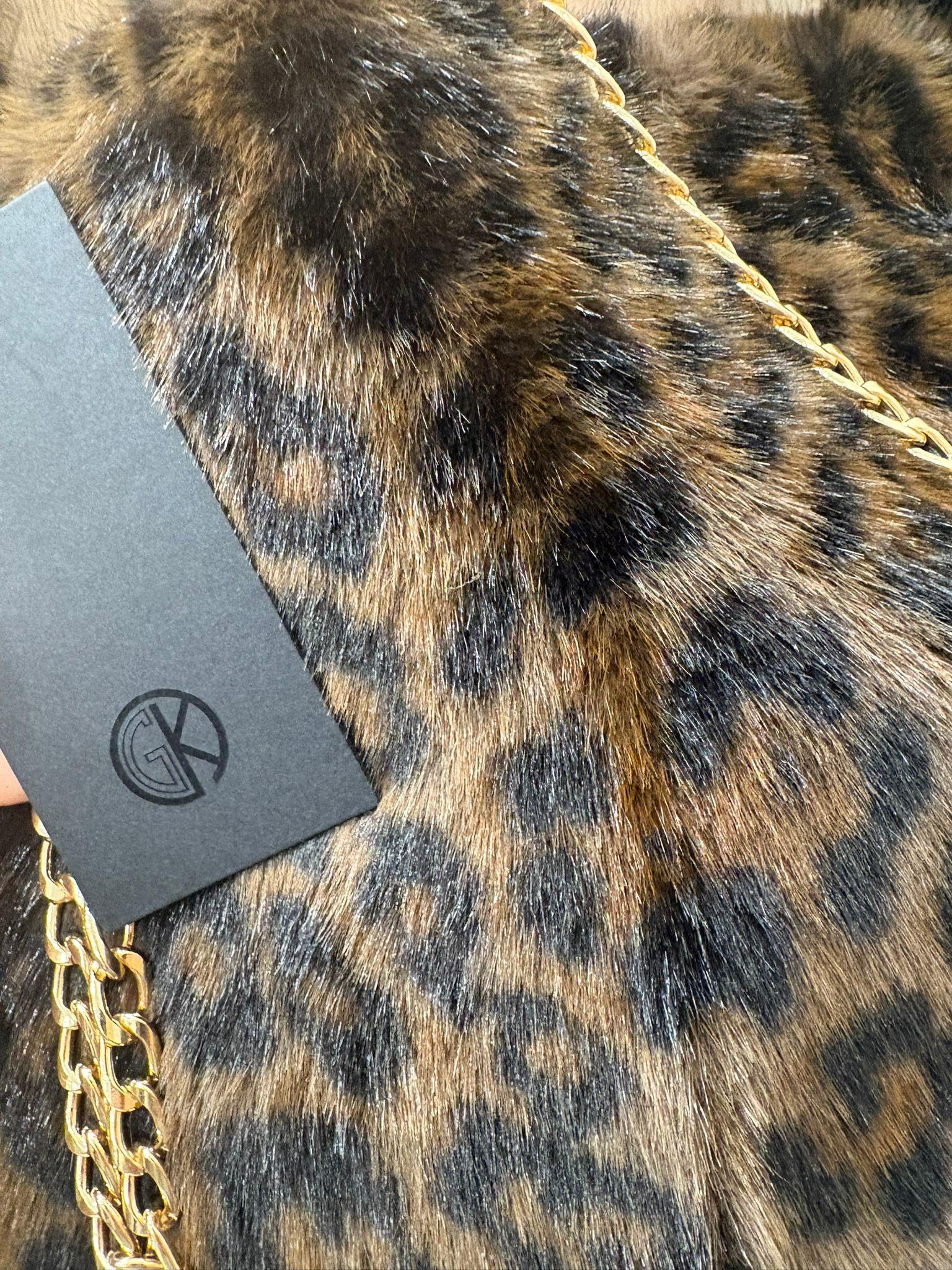 Borsa GK in pelliccia con manico in pelliccia e catena oro